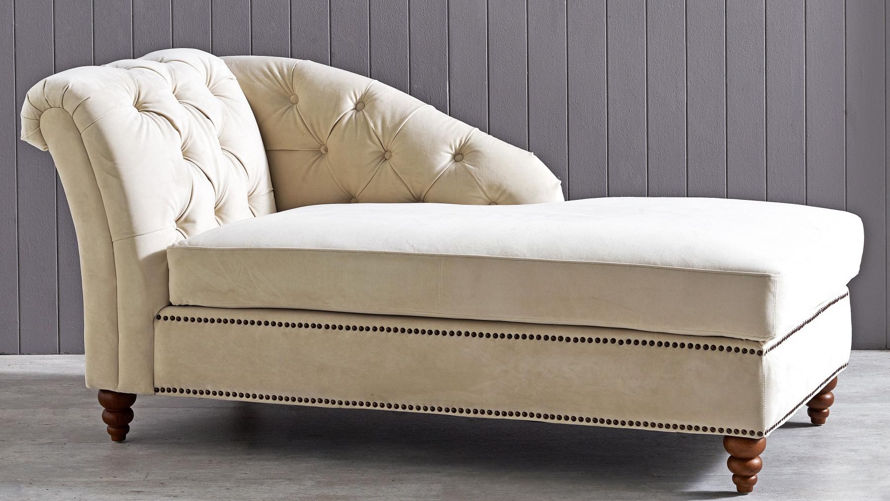 white tufted chaise