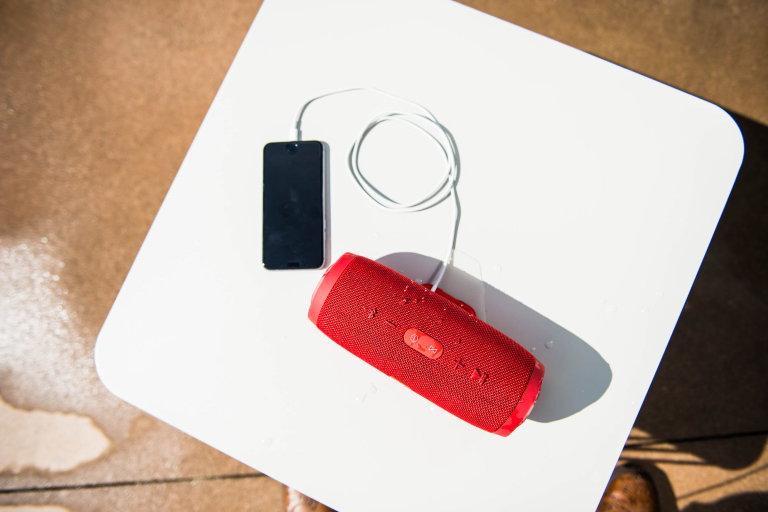 charging phones by the pool